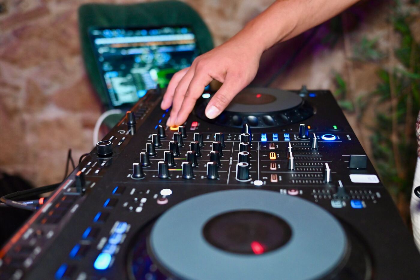 Close-up of the DJ controller during a members' event
