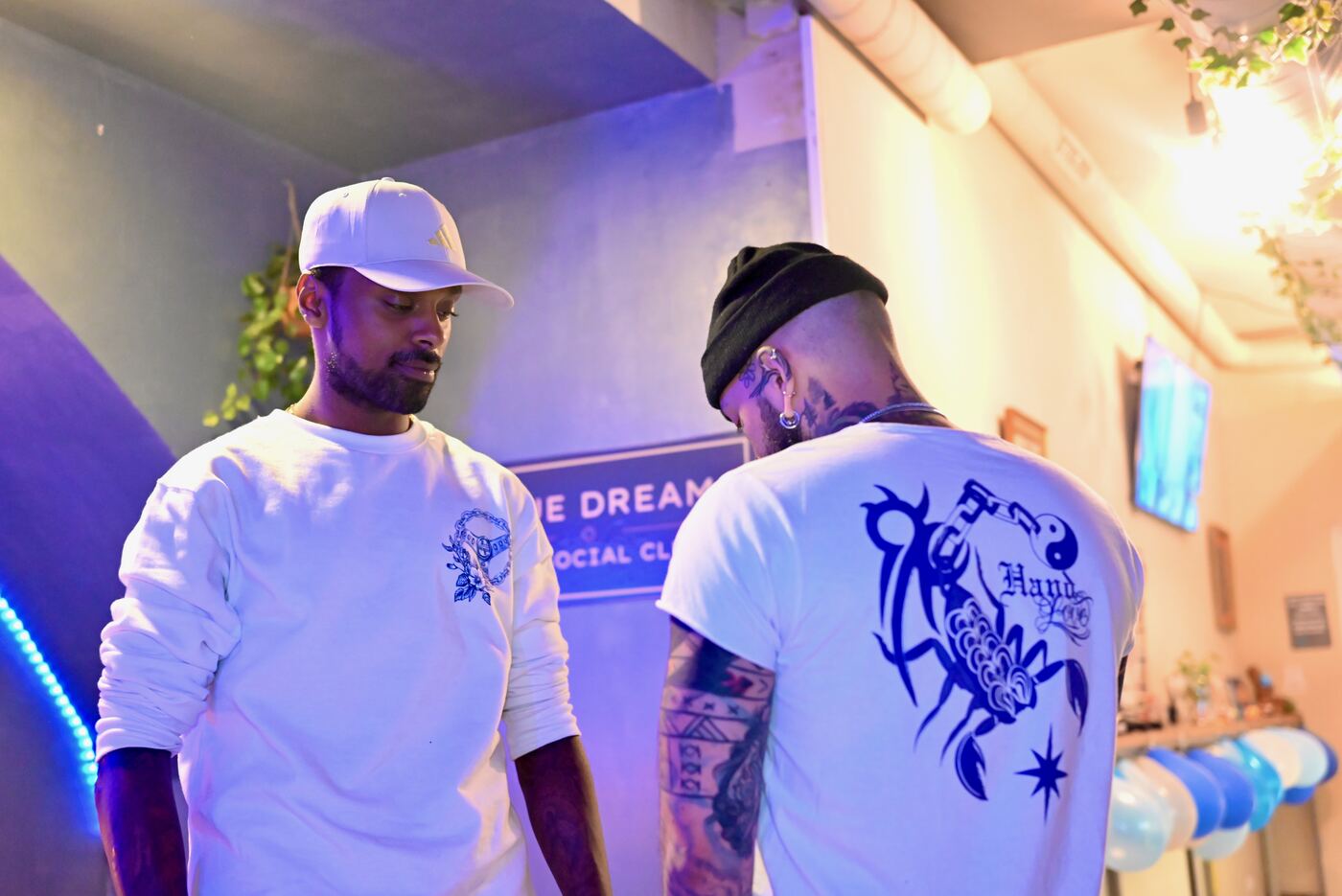 Members wearing Blue Dream designs