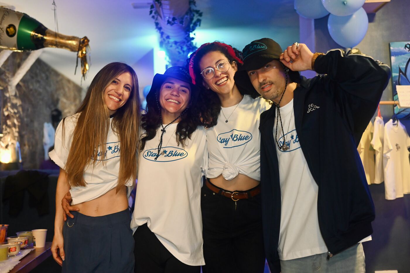 The Blue Dream crew wearing Stay Blue T-shirts