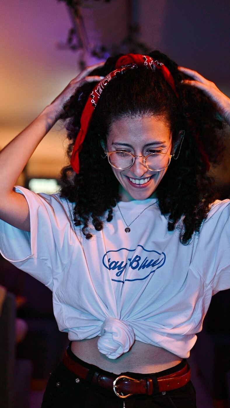 Member wearing a Stay Blue T-shirt